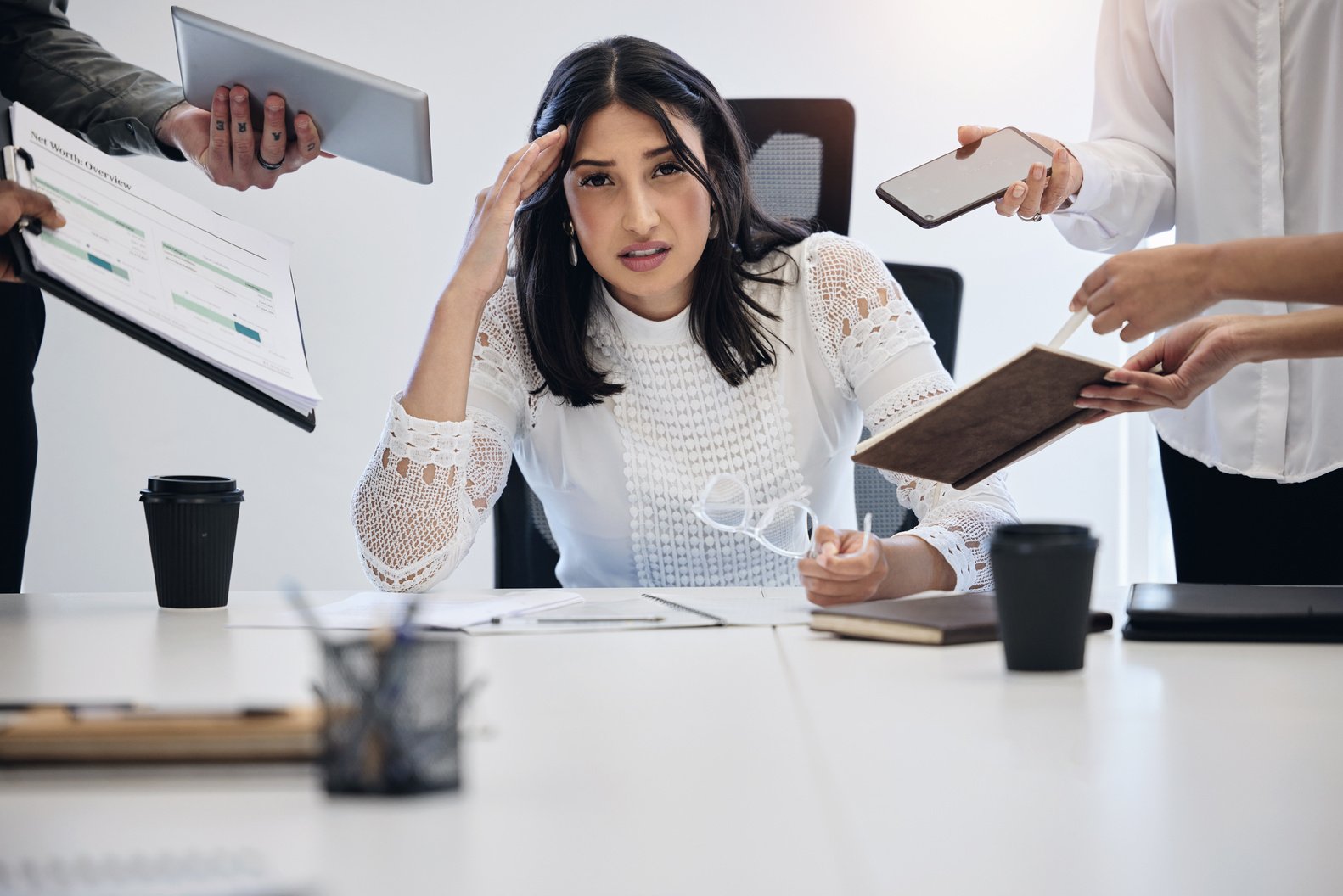 Portrait, Multitask and an Overwhelmed Business Woman at Work on a Laptop in an Office for a Deadline. Technology, Stress or Anxiety with a Young Female Employee Feeling Pressure from a Busy Schedule